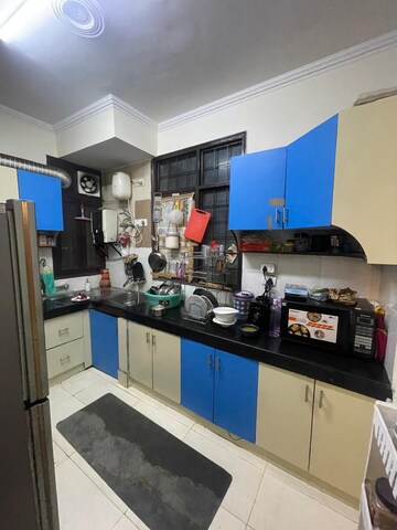 Kitchen in 3 BHK Apartment at Tarika CGHS, Sector 43 – for Sale