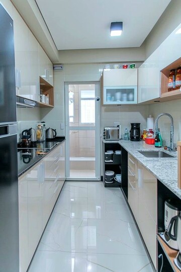 Kitchen in 3 BHK Apartment at Mulund Tulip CHS, Mulund West – for Rent