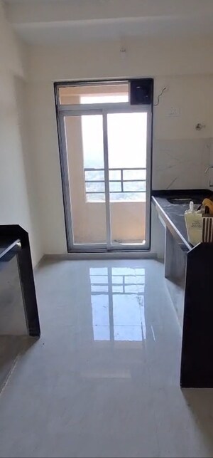 Kitchen in 2 BHK Apartment at Mahavir Kalpavruksha, Ghodbunder Road – for Sale