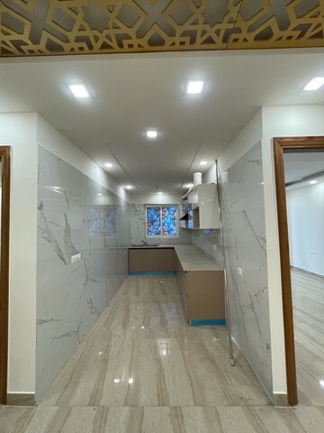 Kitchen in 3.5 BHK Builder Floor at BPTP Parkland Pride, Sector 77 – for Sale