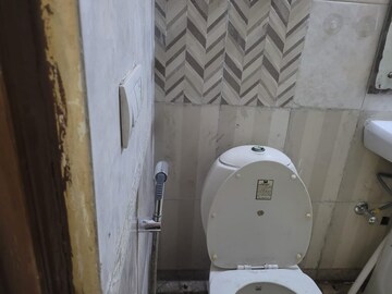 Bathroom in 4 BHK Apartment at Niho Hi Bird Scottish Garden, Ahinsa Khand 2 – for Rent