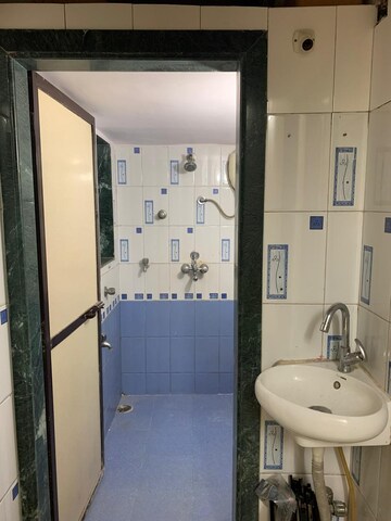 Bathroom in 1 BHK Apartment at Highland Residency CHSL, Balkum Pada – for Rent