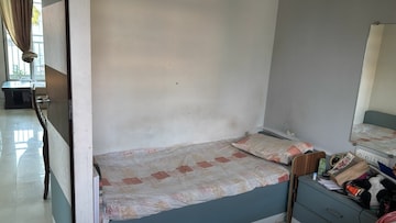 Bedroom in 2 BHK Apartment at Pinnacle CHS, Mulund West – for Sale