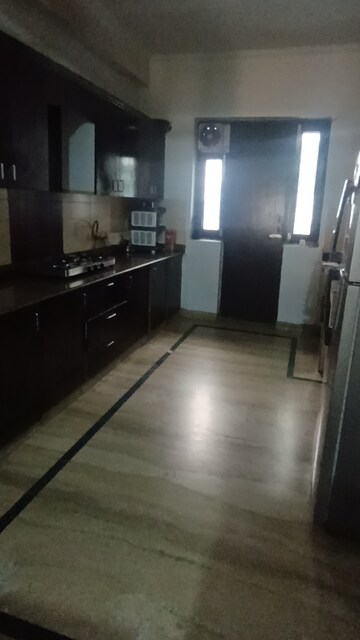 Kitchen in 2 BHK Apartment at Prateek Wisteria, Sector 77 – for Rent