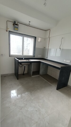 Kitchen in 2 BHK Apartment at Elegant Navratnamala CHS, Santacruz East – for Sale