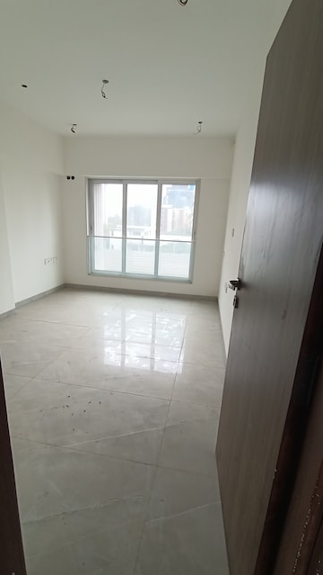 Room in 2 BHK Apartment at Elegant Navratnamala CHS, Santacruz East – for Sale