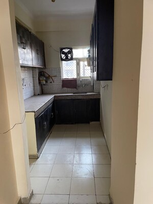 Kitchen in 2 BHK Apartment at Nilaya Greens, Raj Nagar Extension – for Sale