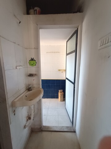 Kitchen in 1 BHK Apartment at Highland Residency CHSL, Balkum Pada – for Sale