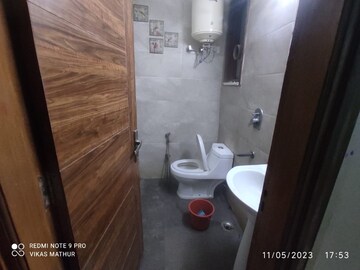 Bathroom in 1.5 BHK Apartment at Paryavaran Complex – for Rent