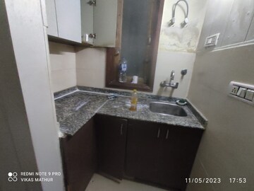 Kitchen in 1.5 BHK Apartment at Paryavaran Complex – for Rent