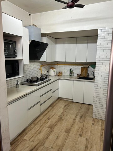 Kitchen in 4 BHK Apartment at Puri The Pranayam, Sector 82 – for Sale