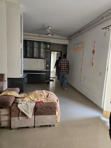 Living Room in 2 BHK Apartment at Aditya Luxuria Estate, Dasna – for Rent