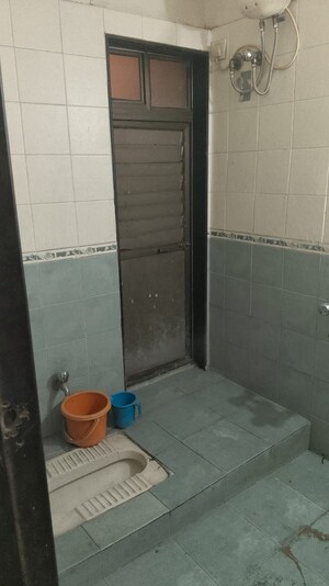 Bathroom in 2 BHK Apartment at Manpada – for Sale