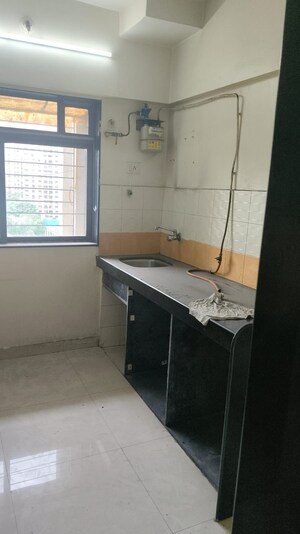 Kitchen in 2 BHK Apartment at Manpada – for Sale