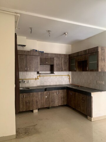 Kitchen in 2 BHK Apartment at Mahagun Mahagunpuram II, Lal Kuan – for Rent