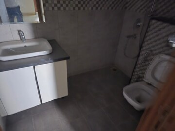 Bathroom in 4 BHK Apartment at Uchdpl Veridia Oakwood Enclave, Wave City – for Rent