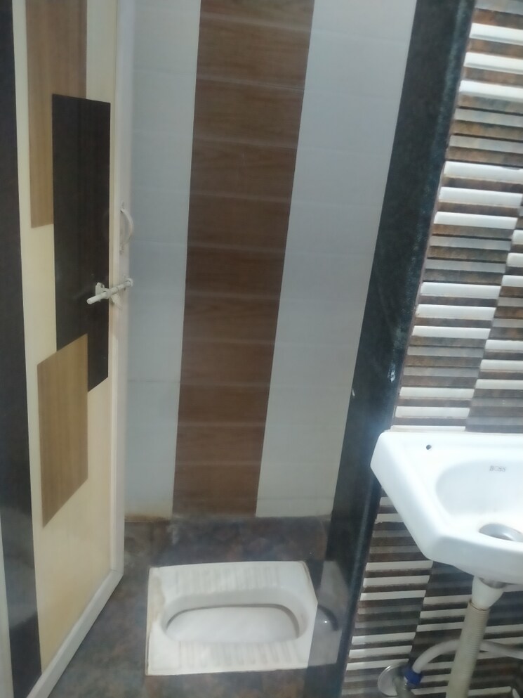 Bathroom, bhatar 2 Bedroom 950 Sq.Ft. Apartment In Bhatar Surat 8854723