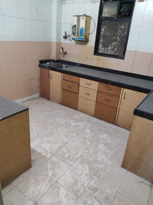Kitchen in 1 BHK Apartment at Sandhya Shankar Niwas, Dombivli East – for Sale