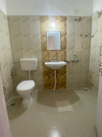 Bathroom in 3 BHK Apartment at Sargam Apartment, Jankipuram – for Sale