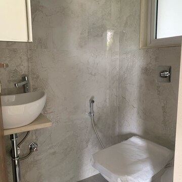 Bathroom in 2.5 BHK Apartment at Shraddha Elite, Poisar – for Rent