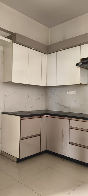 Kitchen in 3 BHK Apartment at Prateek Grand Carnesia, Siddharth Vihar – for Rent