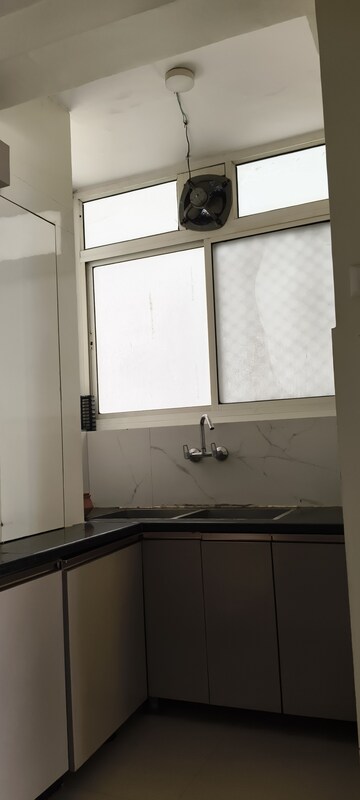 Kitchen in 3 BHK Apartment at Prateek Grand Carnesia, Siddharth Vihar – for Rent