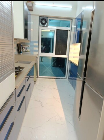 Kitchen in 2.5 BHK Apartment at Ghodbunder Road – for Sale