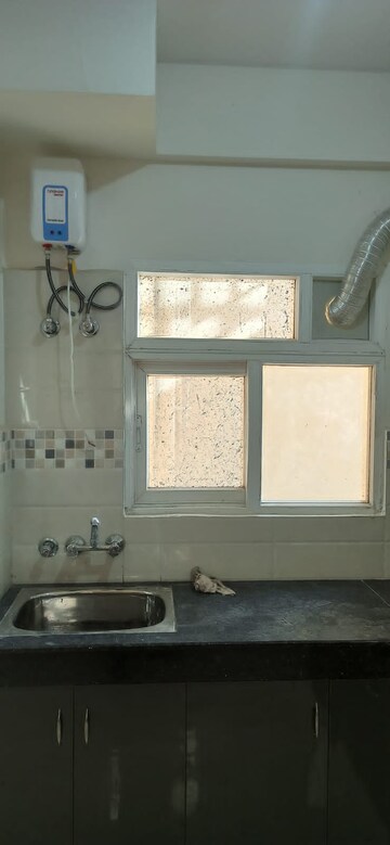 Bathroom in 2 BHK Apartment at Signature Global Orchard Avenue, Sector 93 – for Sale