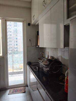 Kitchen in 3 BHK Apartment at T Homes Phase 1, Siddharth Vihar – for Sale