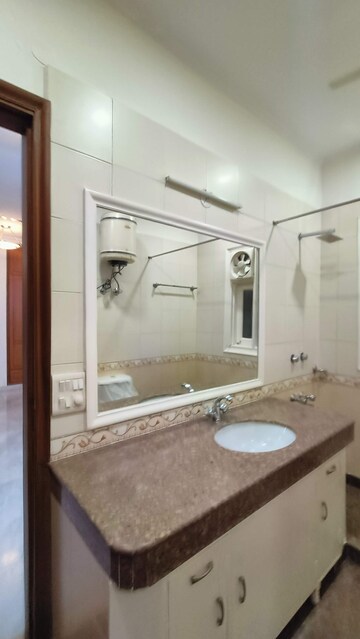 Bathroom in 3 BHK Apartment at Florence Nightingale Lane, Green Park – for Rent