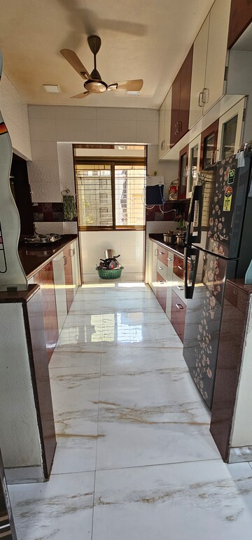 Kitchen in 2 BHK Apartment at Atmaram Sadan, Vishnu Nagar – for Sale