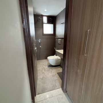 Bathroom in 1.5 BHK Builder Floor at Dharampal Apartments, Dharam Colony – for Rent