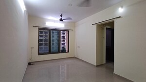 Living Room in 2 BHK Apartment at Hubtown Greenwoods, Vartak Nagar – for Sale
