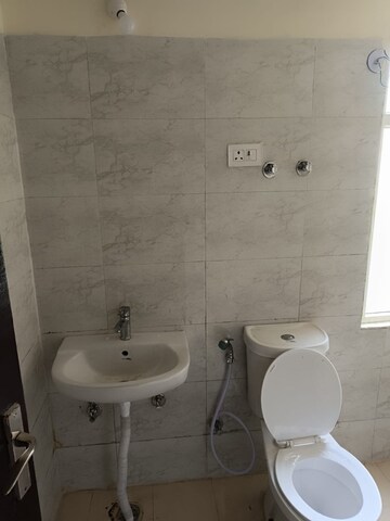 Bathroom in 2.5 BHK Apartment at Amrapali Golf Homes, Sector 4 Greater Noida – for Sale