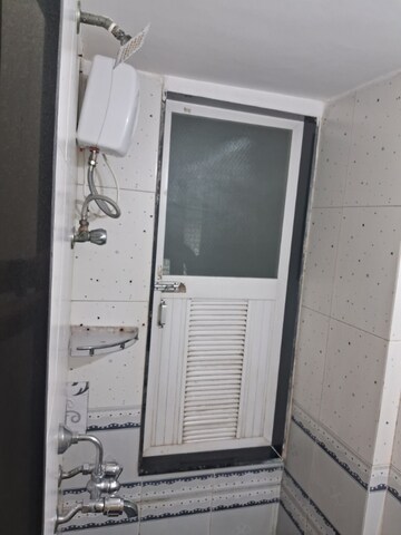 Bathroom in 1 BHK Apartment at Dosti Daffodil, Wadala East – for Rent