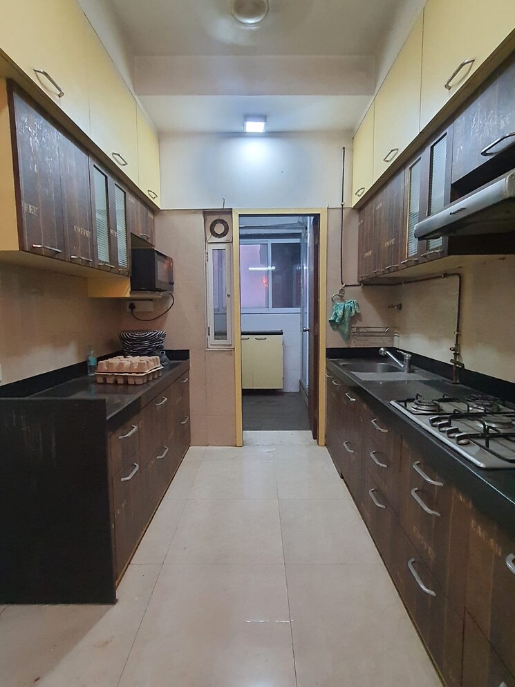 Kitchen, omkar-veda-exclusive 2 Bedroom 800 Sq.Ft. Apartment In Parel Mumbai 8857973