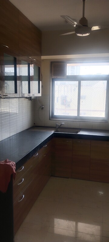Kitchen in 2 BHK Apartment at Lokhandwala Harmony, Worli – for Rent