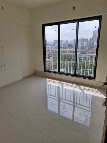 Room in 2 BHK Apartment at Oxford Navrang Crystal, Goregaon West – for Rent
