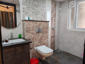 Bathroom in 3 BHK Apartment at Pashmina Waterfront, Old Madras Road – for Rent