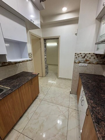Kitchen in 1.5 BHK Apartment at Prateek Grand City, Siddharth Vihar – for Rent