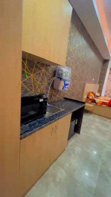 Kitchen in Studio Apartment at Gaur City Center, Sector 4 Greater Noida – for Rent