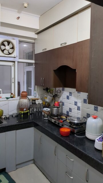 Kitchen in 3 BHK Apartment at Amrapali Golf Homes, Sector 4 Greater Noida – for Rent