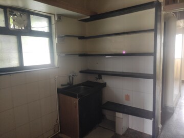 Kitchen in 2 BHK Apartment at Guruwar Peth – for Rent