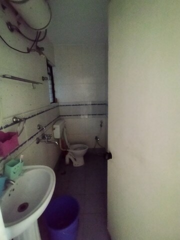 Bathroom in 2 BHK Apartment at Sunflower Apartment CHS, Kondhwa – for Rent