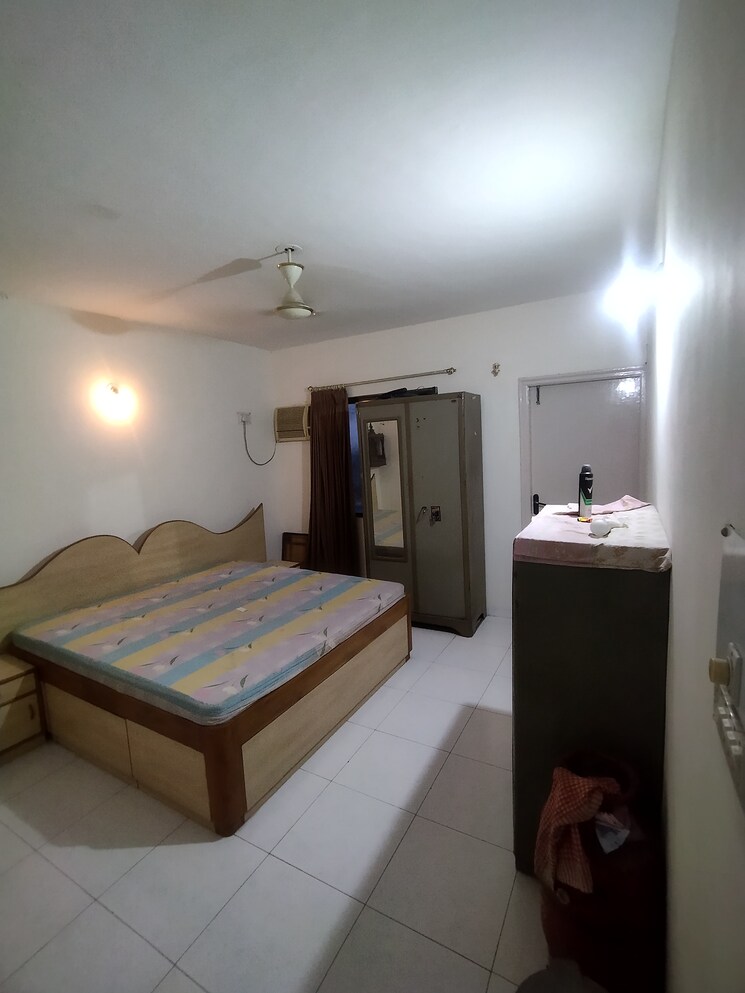 Bedroom, sunflower-apartment-chs 2 Bedroom 1000 Sq.Ft. Apartment In Kondhwa Pune 8858372