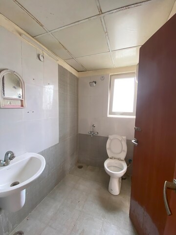 Bathroom in 2 BHK Apartment at Urbtech Xaviers, Sector 168 – for Sale