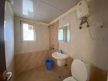 Bathroom in 2.5 BHK Apartment at Urbtech Xaviers, Sector 168 – for Sale