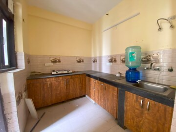 Kitchen in 2.5 BHK Apartment at Urbtech Xaviers, Sector 168 – for Sale