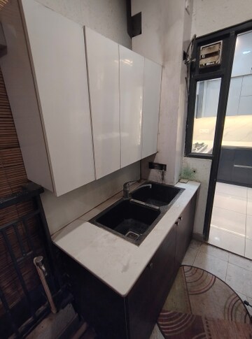 Kitchen in 3 BHK Apartment at Amrapali Golf Homes, Sector 4 Greater Noida – for Rent