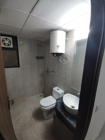 Bathroom in 3 BHK Apartment at Amrapali Golf Homes, Sector 4 Greater Noida – for Rent